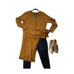 Brown Asymmetrical Tunic with Black Pants and Gold Shoes